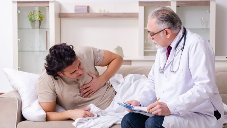 doctor examine the man chest pain