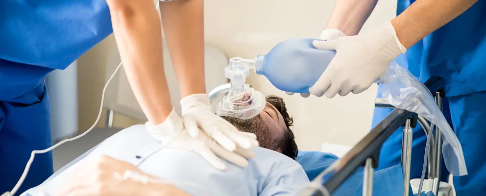 image showing a man on the medical machines surrefering from cardiac emergencies