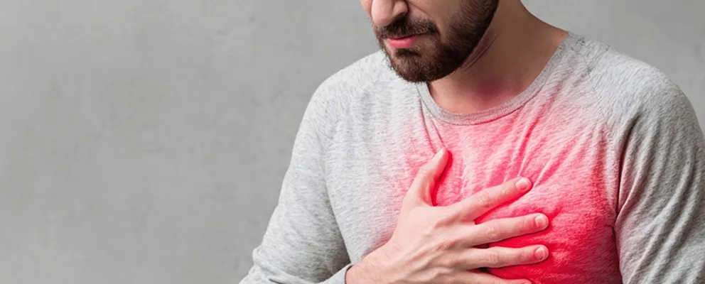 image of a man suffering from chest pain