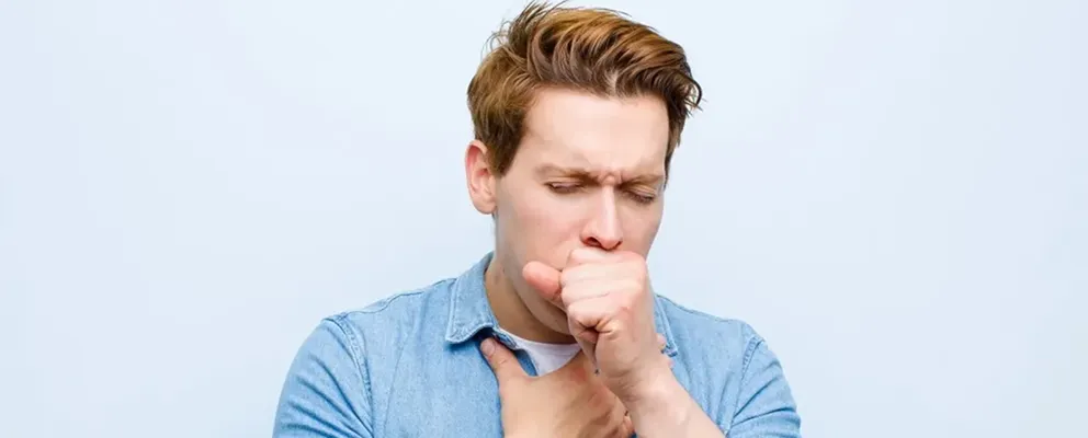 image showing a man coughing very differently