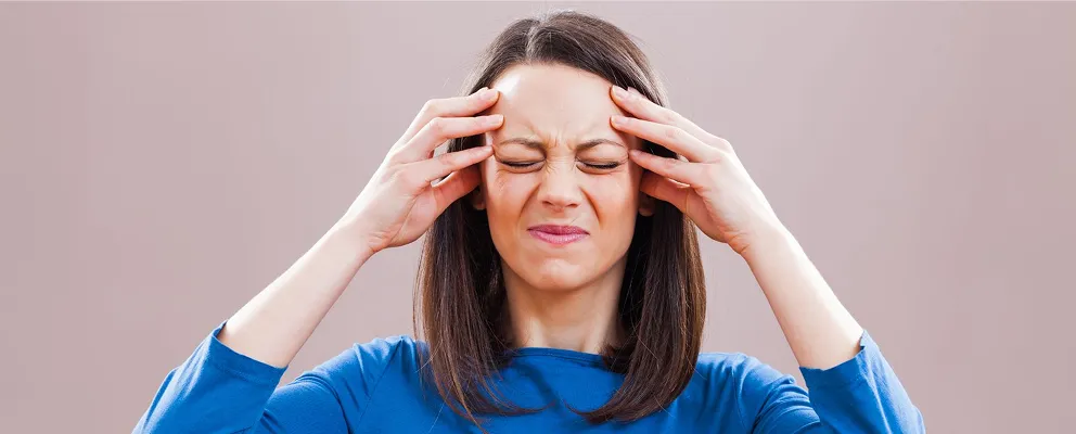 image showing a woman having headache pain