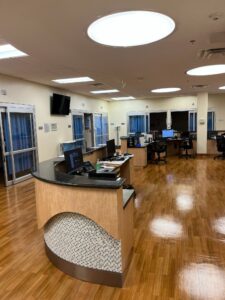 Night view of RapidCare hospital exterior, offering round-the-clock urgent care in San Antonio